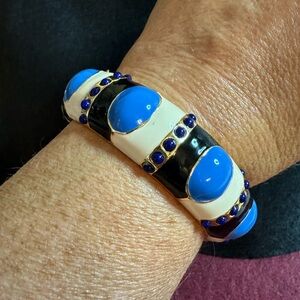 J Crew gold tone black & cream w/cornflower blue enamel cabochon hinged bangle